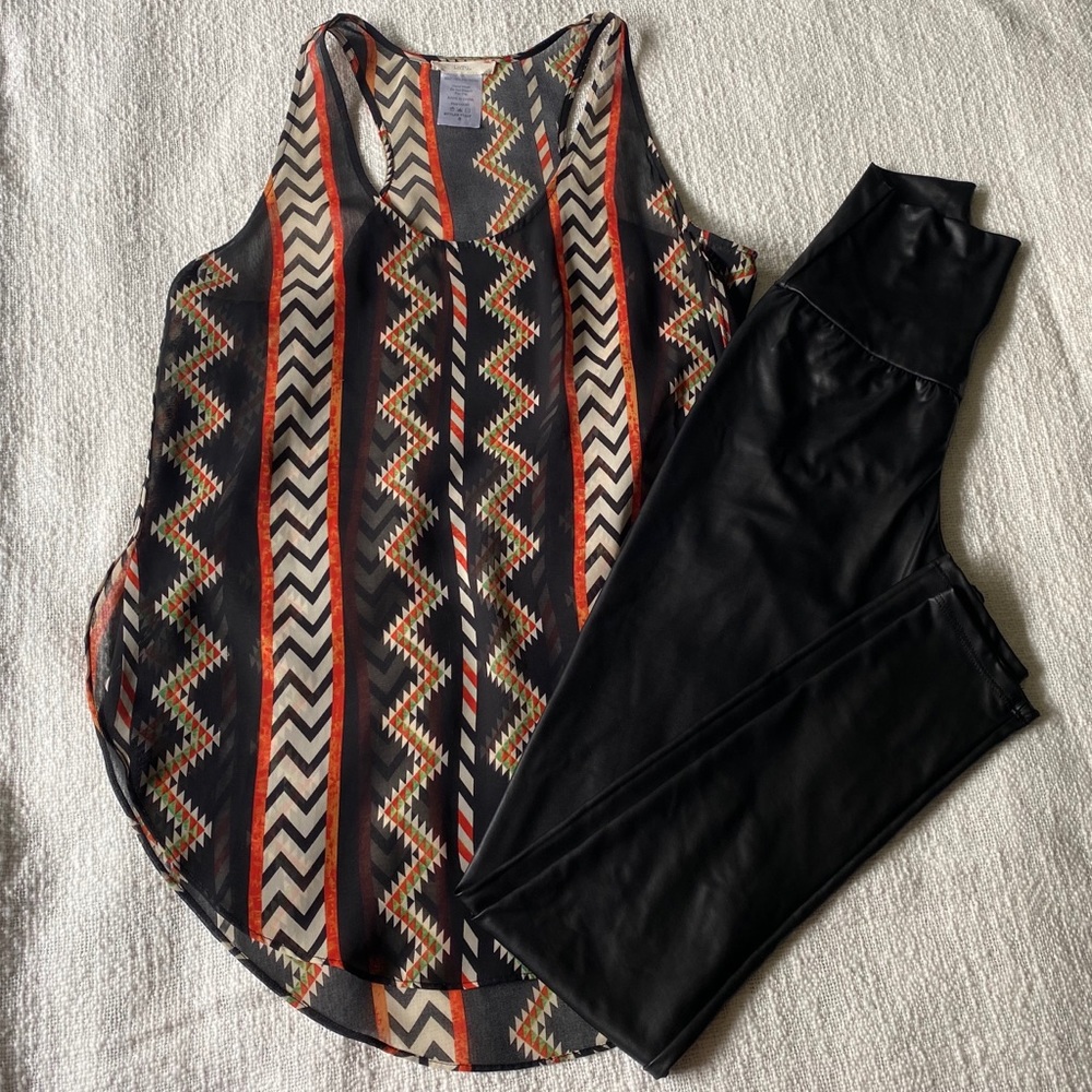 Like New. Printed tank.